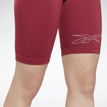 Skinny Pantaloni sportivi di Reebok in rosso