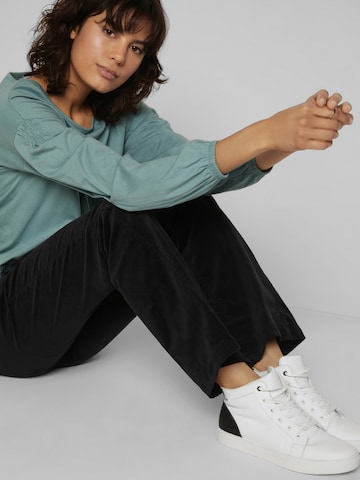 regular Pantaloni di bonprix in nero