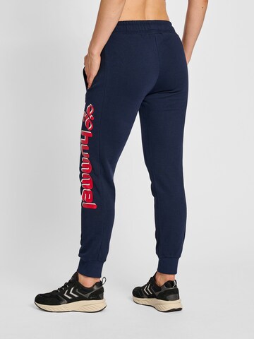 Effilé Pantalon de sport Hummel en bleu