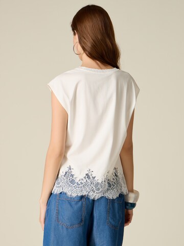 T-shirt oltre en blanc