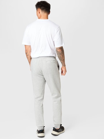 ADIDAS SPORTSWEAR Ozke Športne hlače 'Essentials' | siva barva