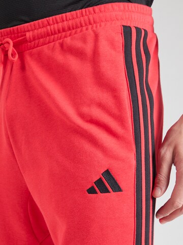 ADIDAS SPORTSWEAR Tapered Sportbroek 'Essential' in Rood