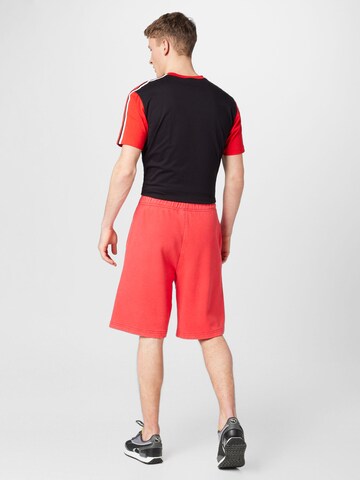 Loosefit Pantalon Champion Authentic Athletic Apparel en rouge