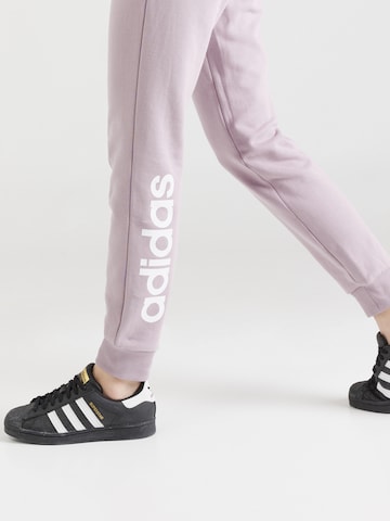 ADIDAS SPORTSWEAR Tapered Παντελόνι φόρμας 'Essentials' σε ροζ