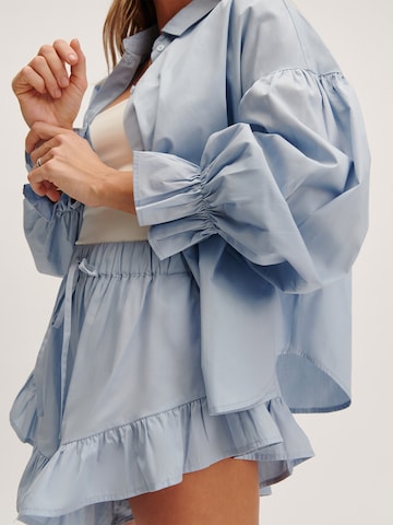 Tatiana Zidekova - Blusa en azul