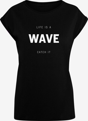 Merchcode Shirt 'Summer - Life is a wave' in Black: front