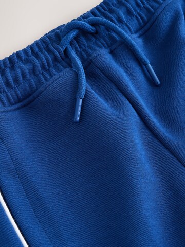 Next Zúžený Kalhoty – modrá