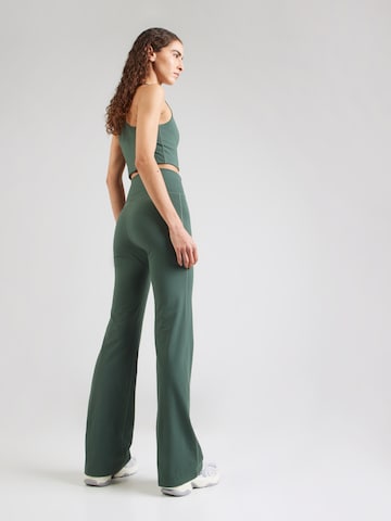 évasé Pantalon de sport Girlfriend Collective en vert