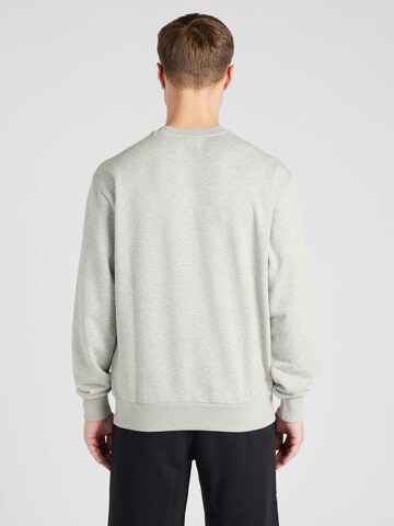 Champion Authentic Athletic Apparel Sweatshirt i grå