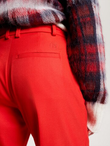 TOMMY HILFIGER Slim fit Trousers in Orange