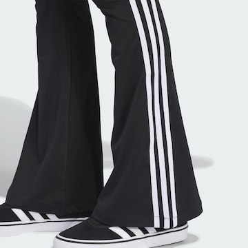 Evazați Leggings de la ADIDAS ORIGINALS pe negru