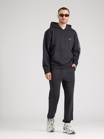 ALPHA INDUSTRIES Zwężany krój Spodnie w kolorze czarny