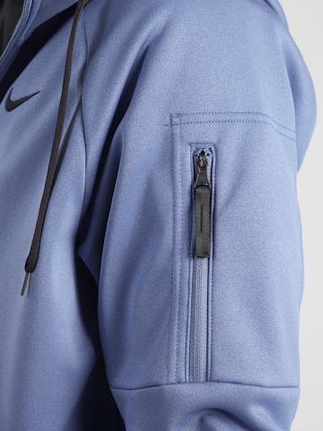 NIKE - Casaco de treino em moletão em azul