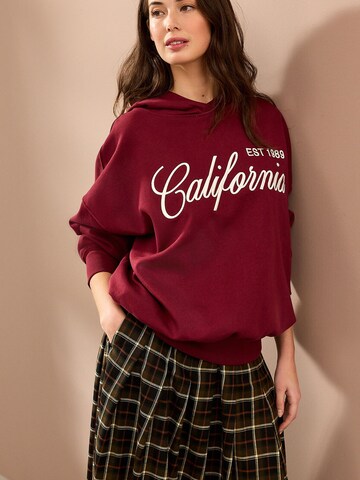Next Pullover i rød: forside