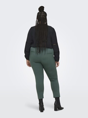 Slimfit Pantaloni 'Goldtrash Classic' di ONLY Carmakoma in verde