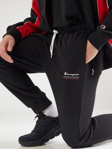 Tapered Pantaloni di Champion Authentic Athletic Apparel in nero