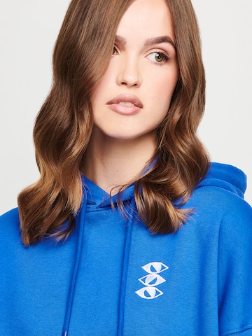 UNFOLLOWED x ABOUT YOU Hoodie 'MOOD' in Blau