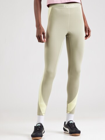 PUMA Skinny Sportbroek 'STRONG' in Groen: voorkant