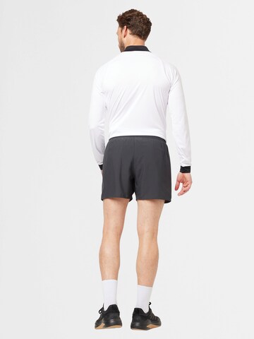 ASICS Regular Sports trousers 'Core 5IN' in Grey