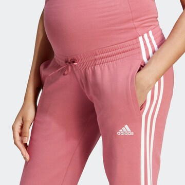ADIDAS SPORTSWEAR Zwężany krój Spodnie sportowe w kolorze różowy