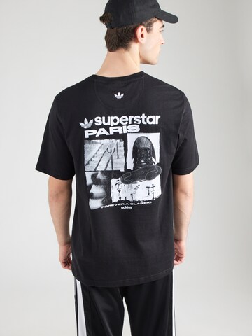 ADIDAS ORIGINALS Μπλουζάκι 'PARIS' σε μαύρο: μπροστά