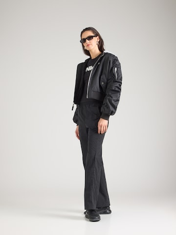 Nike Sportswear - Camisa 'Chill Knit' em preto