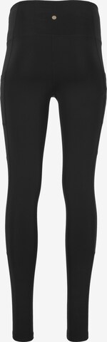 Athlecia Skinny Workout Pants 'Elli' in Black