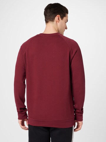 ADIDAS ORIGINALS - Sweatshirt 'Adicolor Classics Trefoil' em vermelho