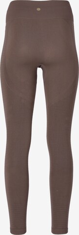 Athlecia Skinny Workout Pants 'NAGAR' in Brown