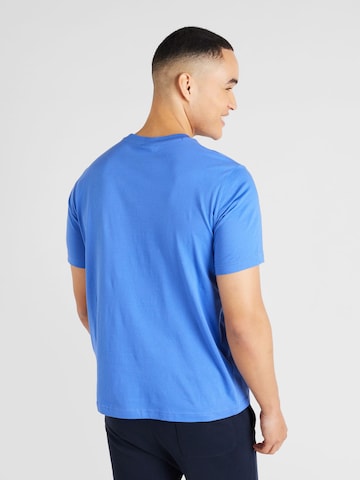 Champion Authentic Athletic Apparel - Camisa em azul