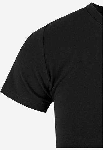 Karl Kani T-Shirt in Schwarz