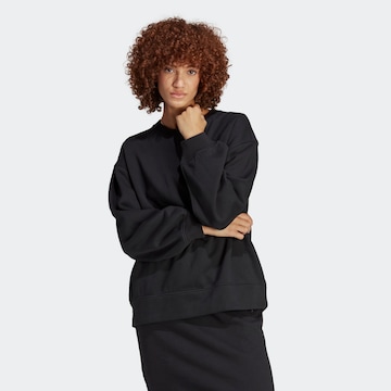 ADIDAS ORIGINALSSweater majica 'Premium Essentials ' - crna boja: prednji dio