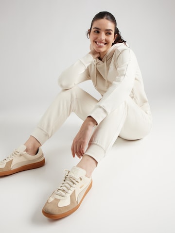 PUMA Тренировочный костюм в Белый
