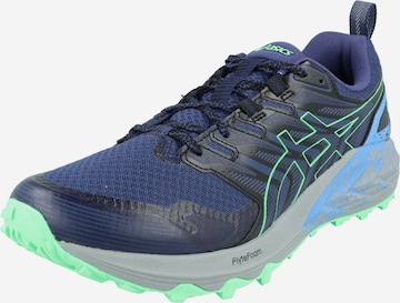 Chaussure de course ASICS en bleu : devant