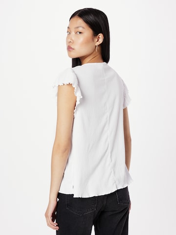 QS - Blusa em branco