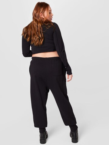 Reebok Loose fit Pants in Black