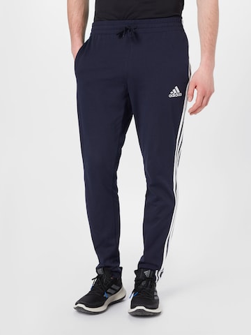 ADIDAS SPORTSWEAR Tapered Urheiluhousut 'Essentials' värissä sininen: edessä