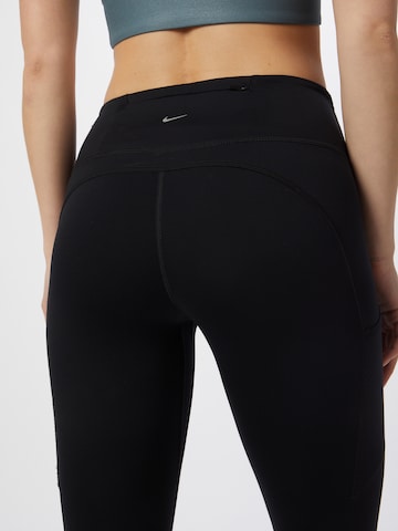 NIKE Skinny Športne hlače 'Epic Luxe' | črna barva