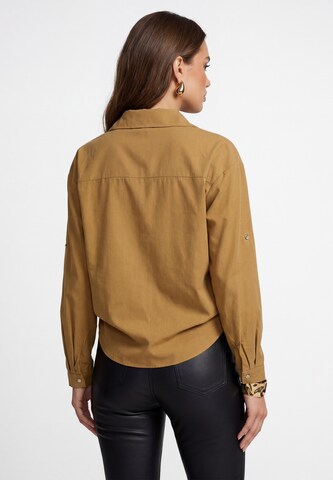 faina - Blusa em amarelo