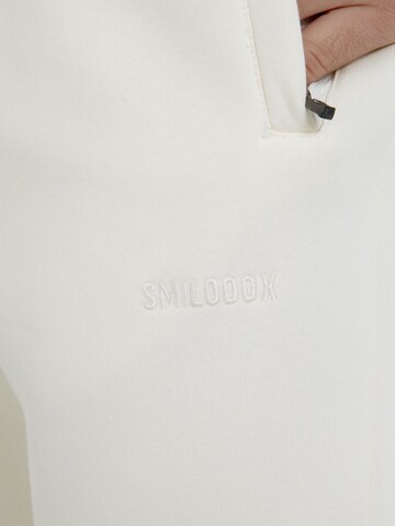 Coupe slim Pantalon 'Evra' Smilodox en beige