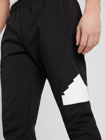 ADIDAS SPORTSWEAR Tapered Urheiluhousut värissä musta