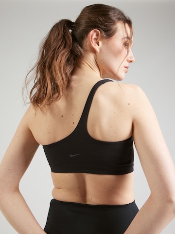 NIKE Bralette Sports bra 'ZENVY' in Black