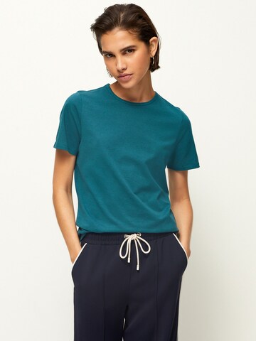 Next T-Shirt in Blau: Vorderseite