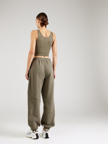 Reebok Конический (Tapered) Штаны в Зеленый