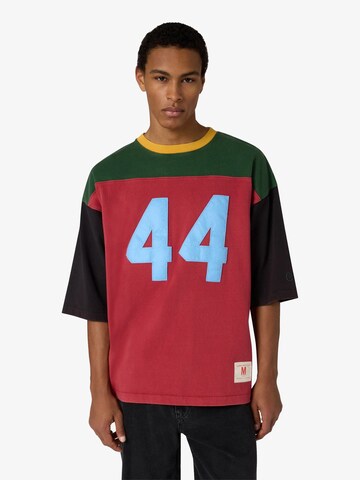 Champion Authentic Athletic Apparel - Camisa em vermelho: frente