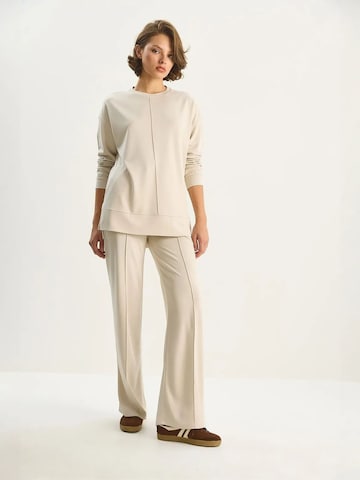 Bianco Lucci - Roupa de casa em bege