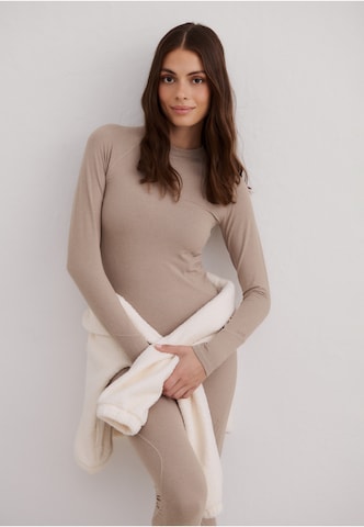 Base layer di Aim'n in marrone: frontale