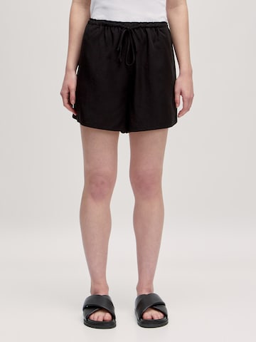 EDITED Loose fit Pants 'Arven' in Black: front