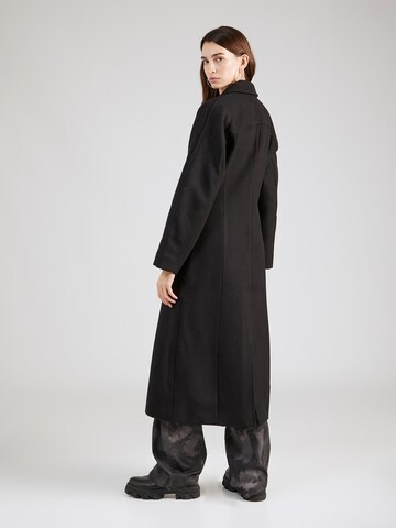 Manteau mi-saison 'Delia' WEEKDAY en noir