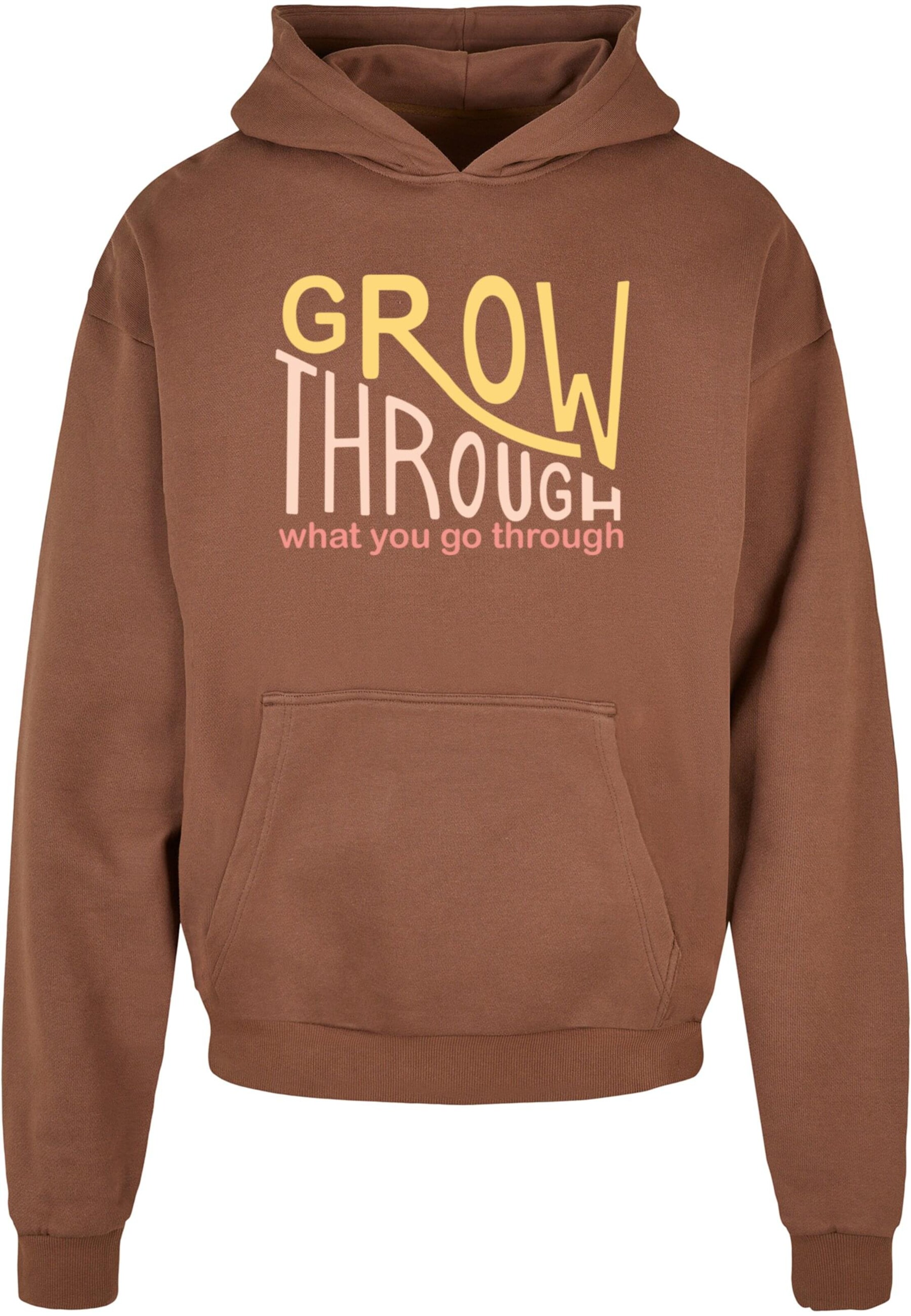 Merchcode Sweatshirt 'Spring - Grow Through 2' in Bruin: voorkant